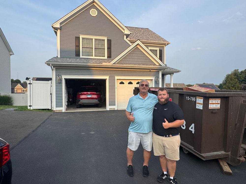 Dan with CT Customer after home roof repair